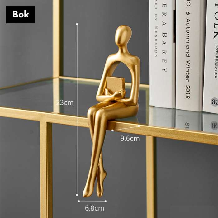 Gullfargede abstrakte figurer