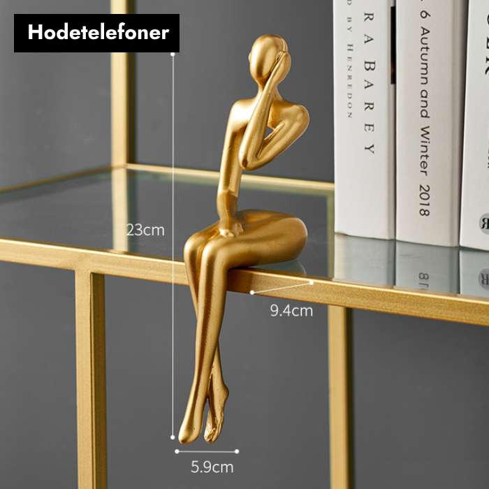 Gullfargede abstrakte figurer