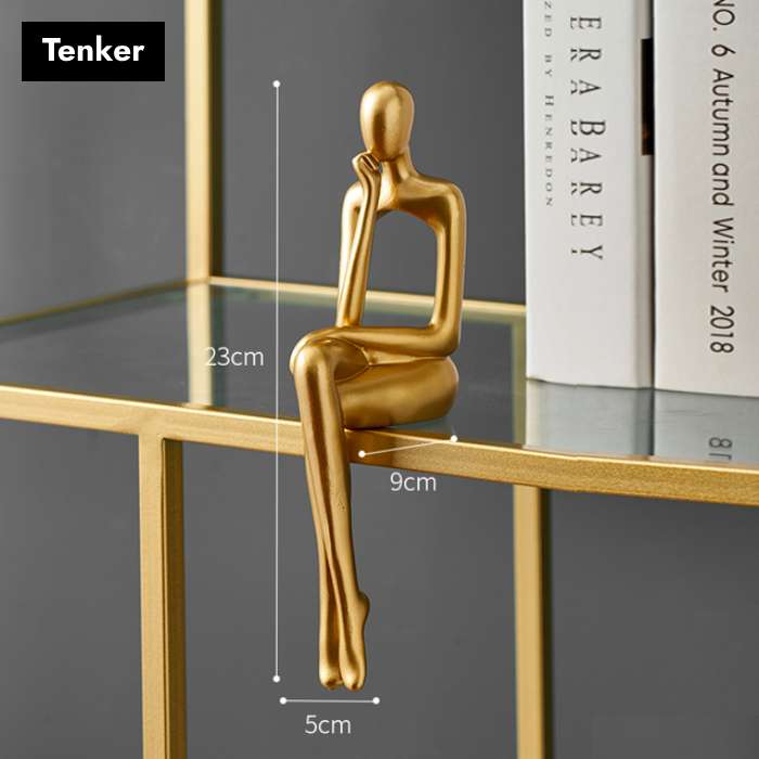 Gullfargede abstrakte figurer